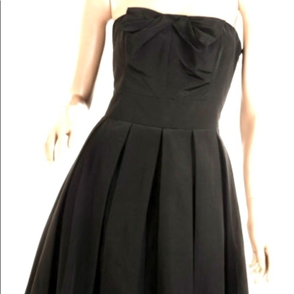 A/X Armani Exchange black taffeta strapless dress.
Size 4
C - Picture 3 of 5